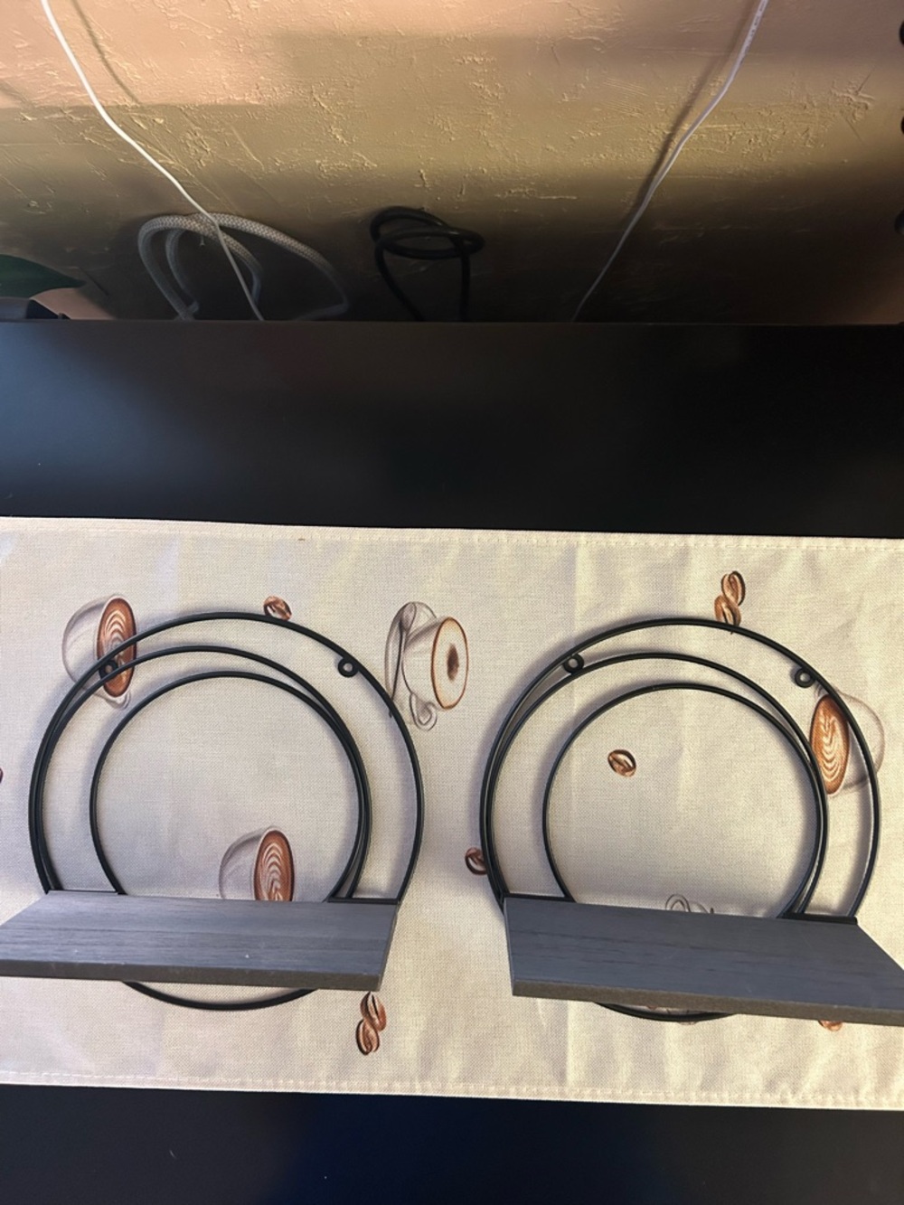 Black and gray Circular Wall Shelves
